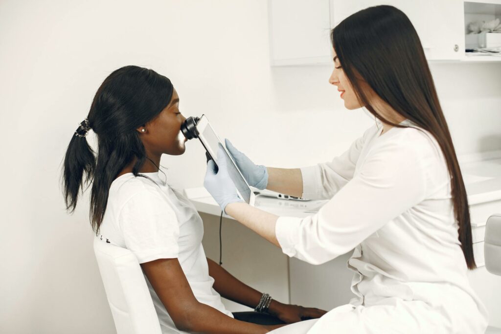 Dermatologist Checking Patient Skin